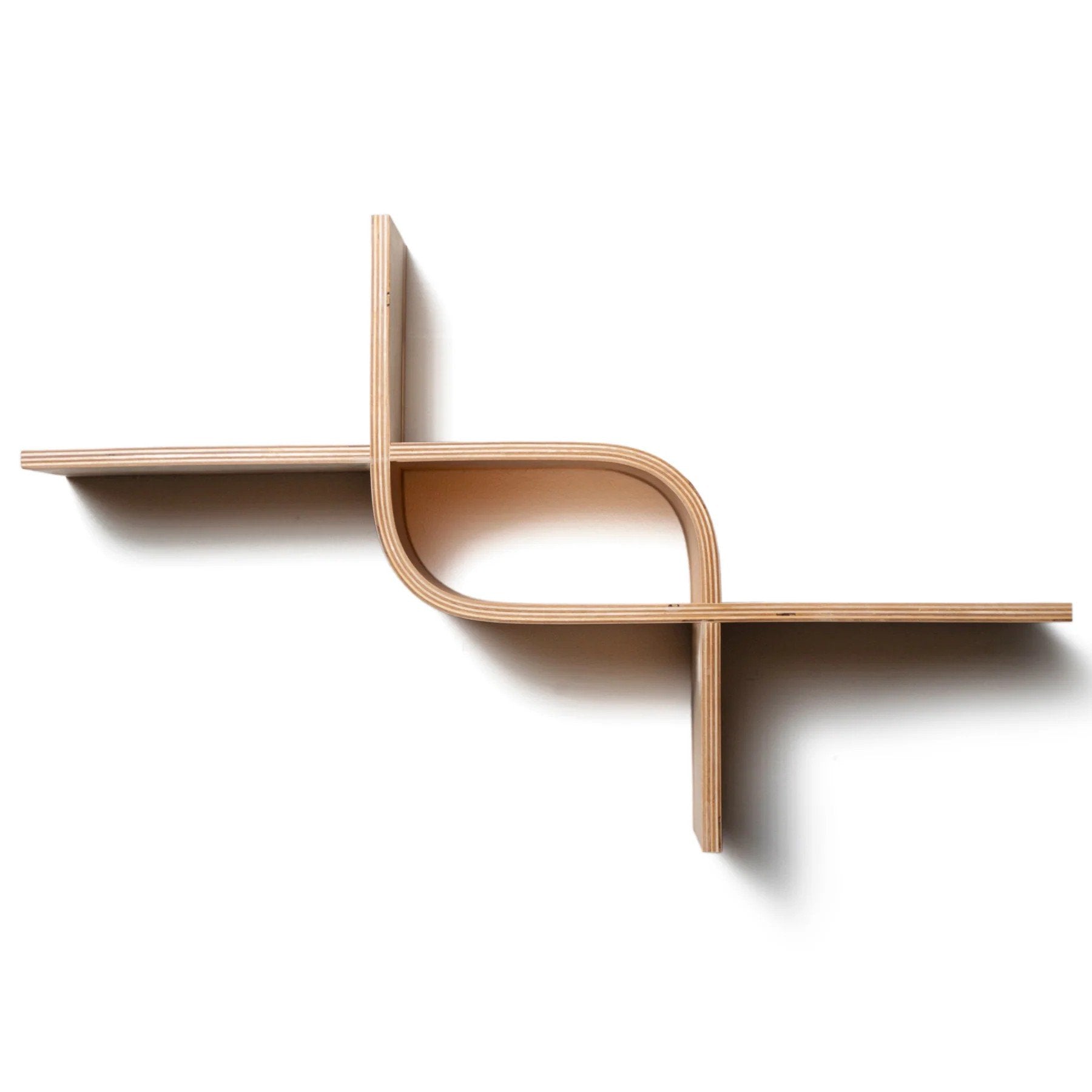 4. Flat lay of wooden floating shelf with wave-inspired design against white background