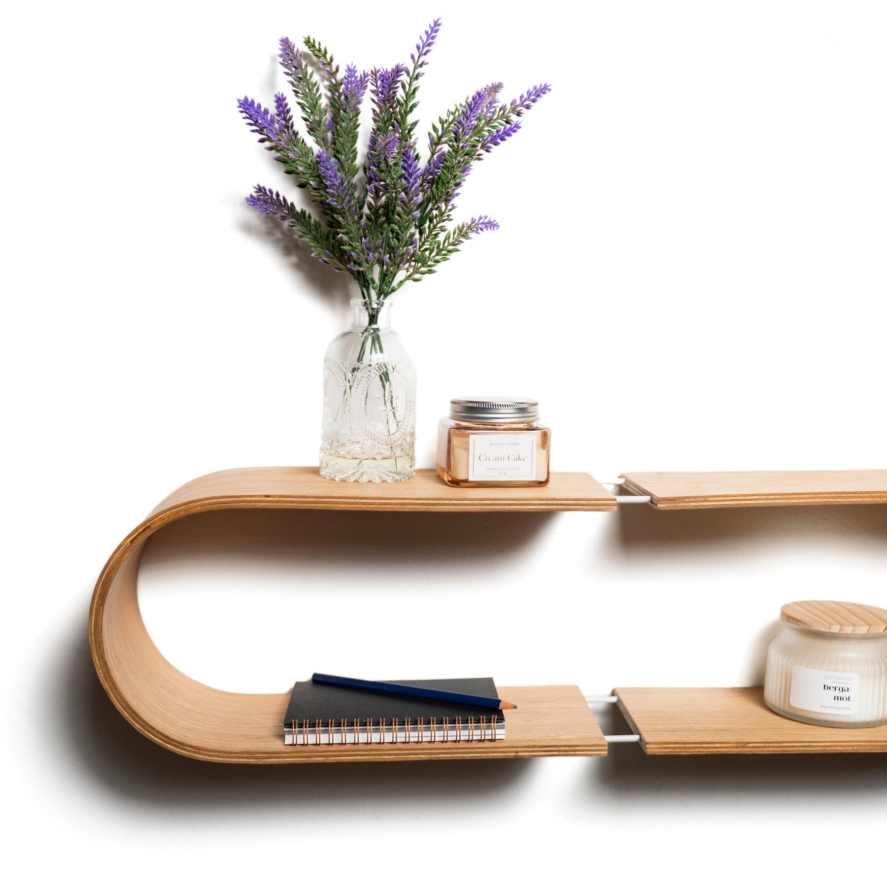 1. Oval wooden wall shelf with lavender and candles, styled for home decor