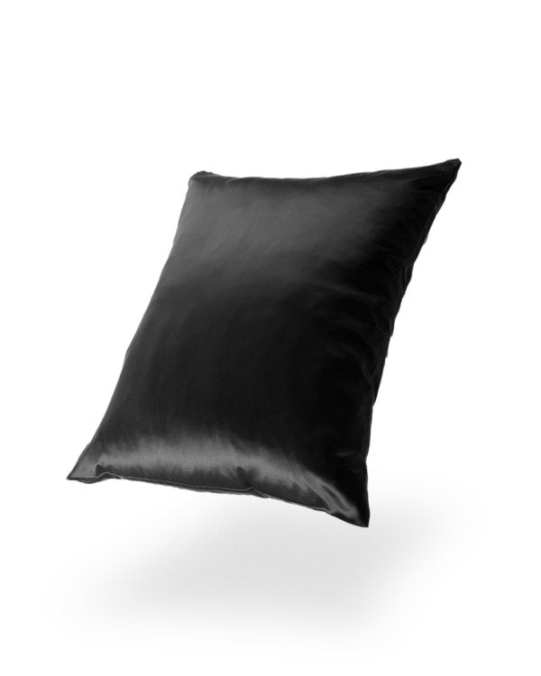 8. Black Mulberry silk pillowcase floating against a black background, showcasing elegance