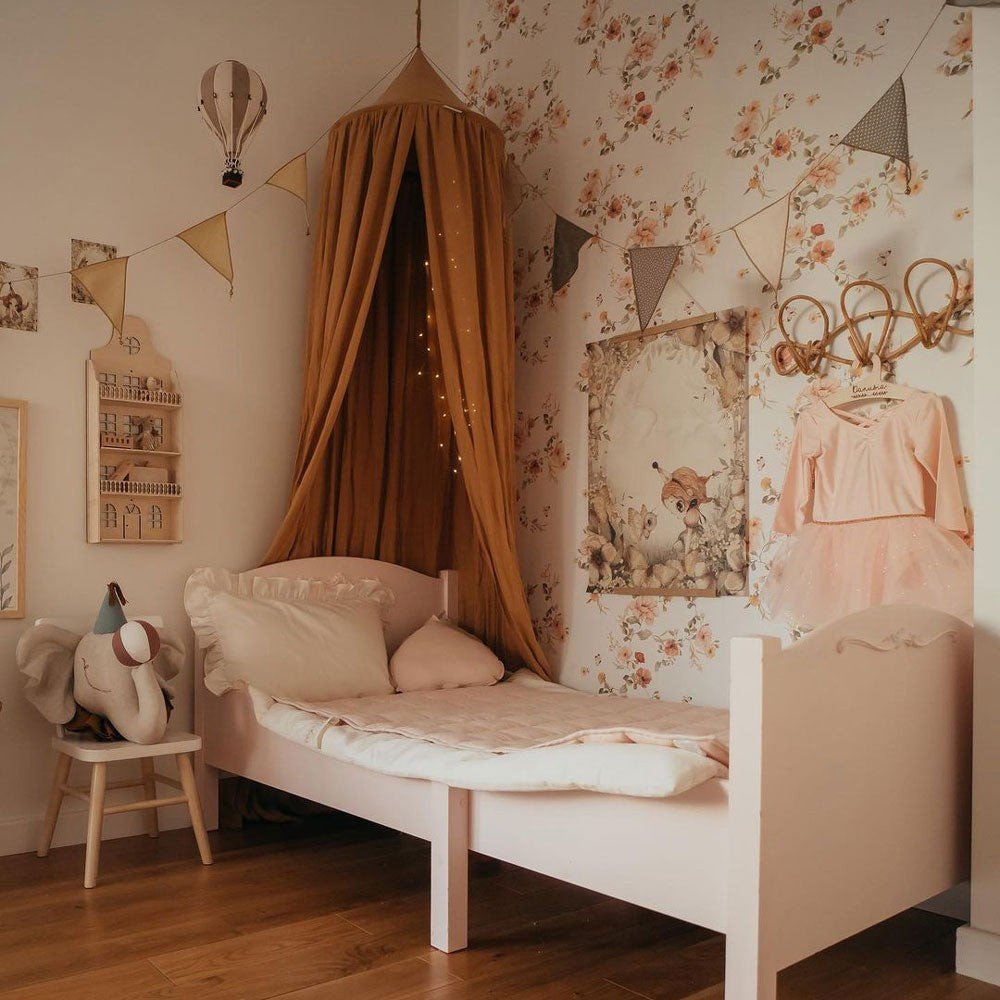 8. Children's room with floral vintage wallpaper, canopy bed, and whimsical decor