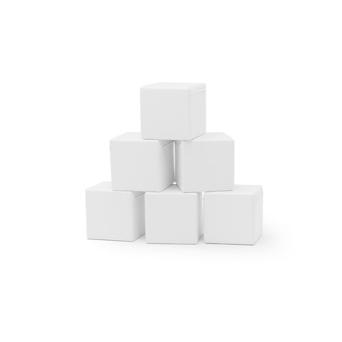 1. Set of six white foam building blocks stacked in a pyramid on a white background