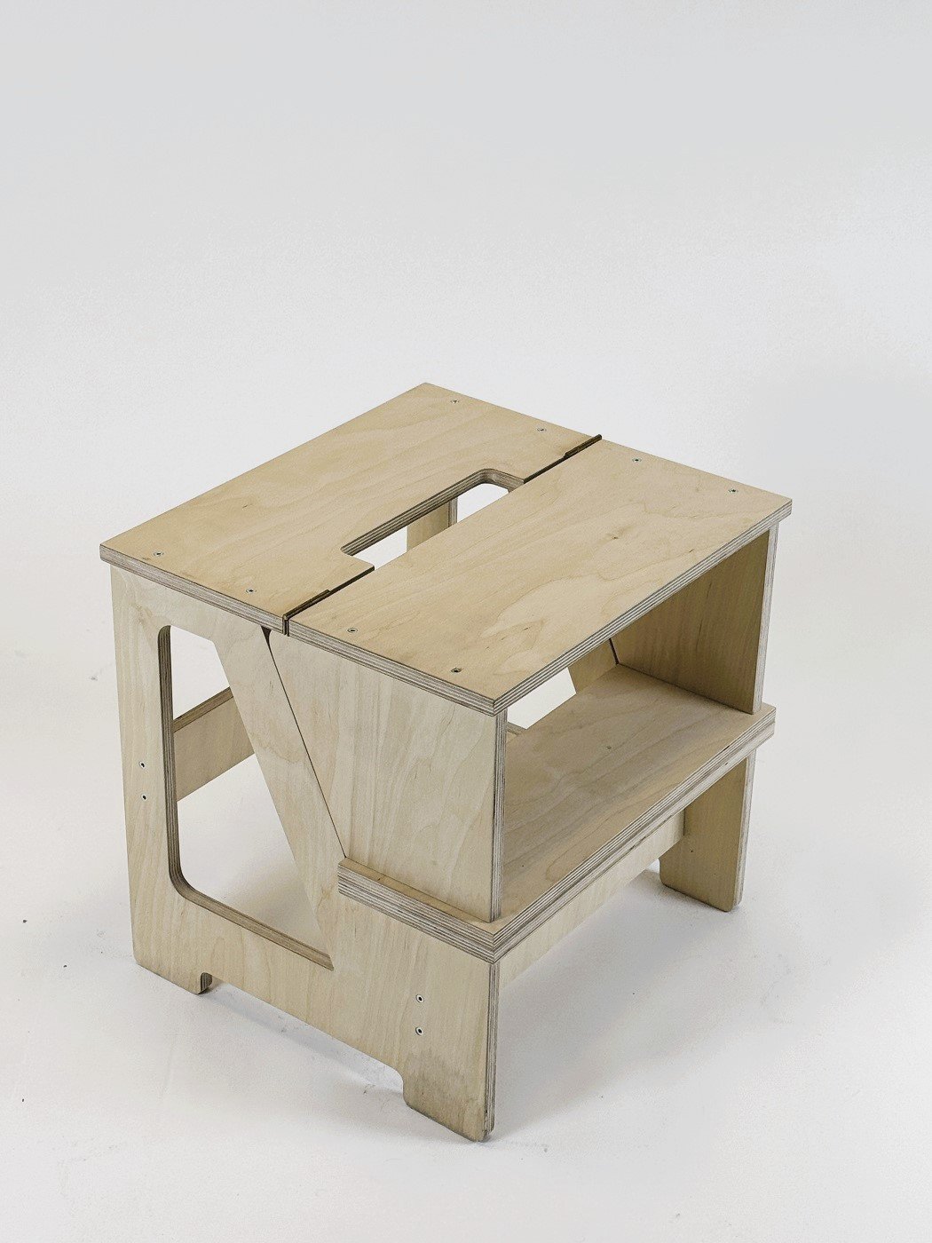 2. Wooden folding seat and climbing helper in studio setting with compact folded form
