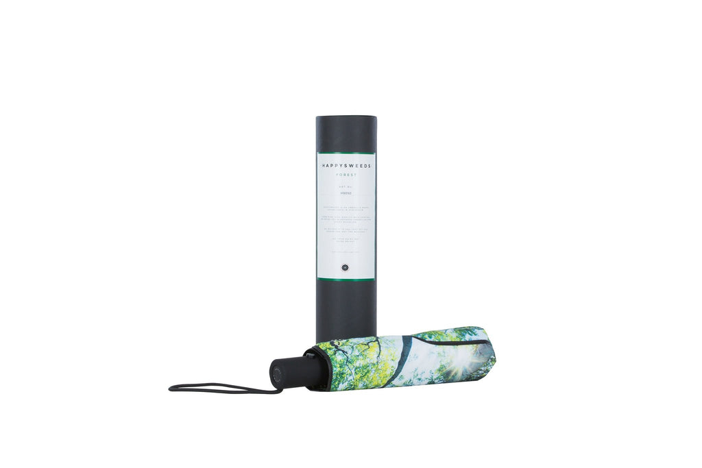 2. Forest print umbrella with black handle and branded packaging tube