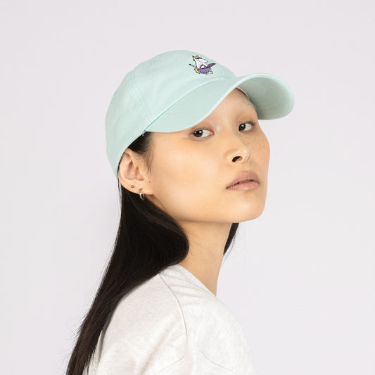 1. Women's Snorkmaiden Dad Cap in mint by Moomin, worn by model in studio