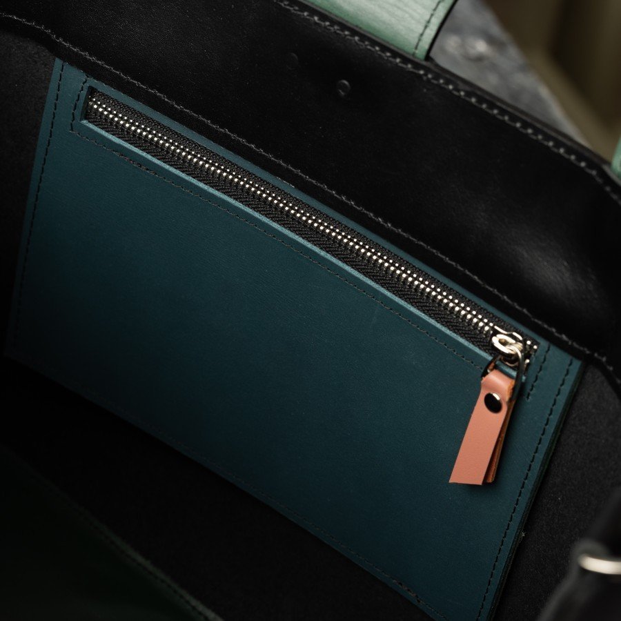 9. Interior view of MONIKA tote bag showing zippered pocket