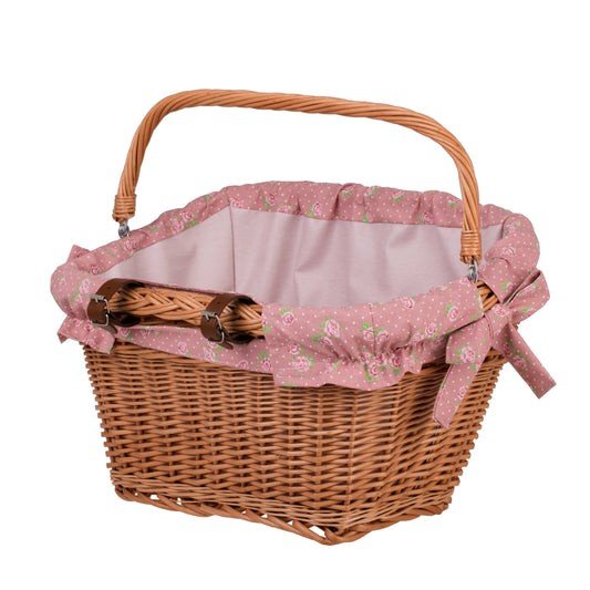 3. Front view of handmade wicker bike basket with pink floral fabric liner and handle, emphasizing practicality and charm