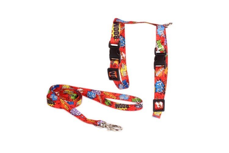 2. Red graffiti-patterned cat harness and leash set by Matteo, featuring colorful text design and black buckles, shown on a white background