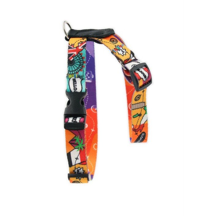 2. Colorful dog harness with travel-themed pattern featuring landmarks like the Statue of Liberty and Eiffel Tower, shown on a white background