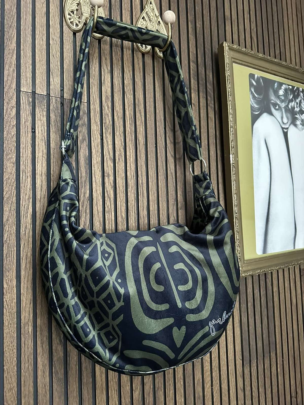 5. Close-up of Garbanota Hobo Bag in khaki pattern, highlighting the soft velour texture and detailed design