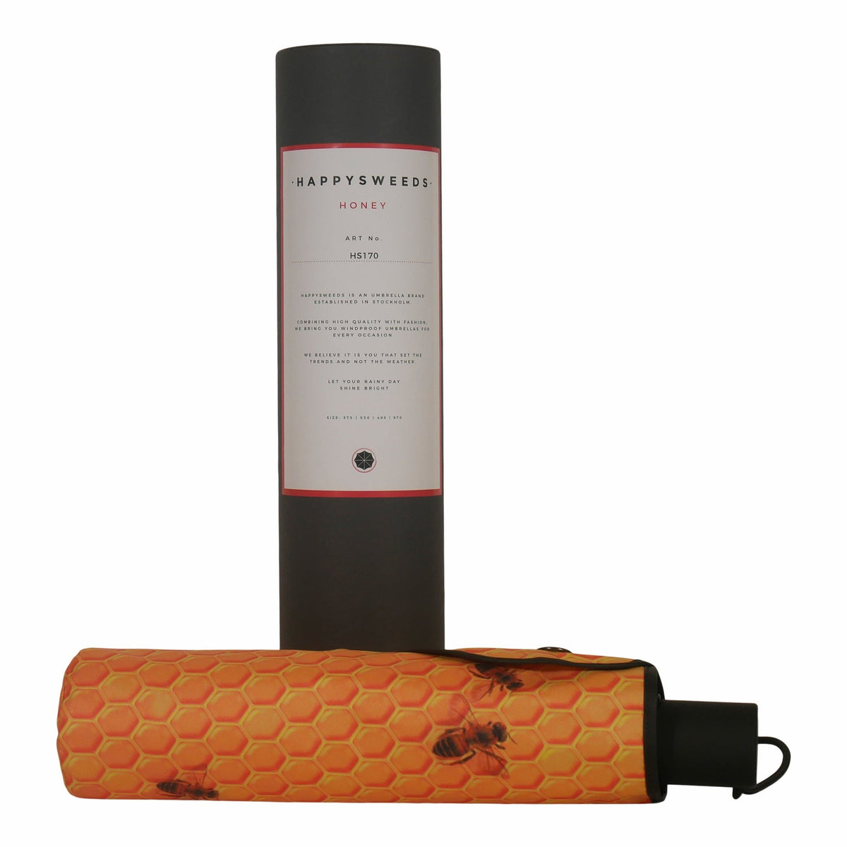 4. Honey Umbrella in honeycomb pattern with branded packaging, emphasizing stylish and compact design