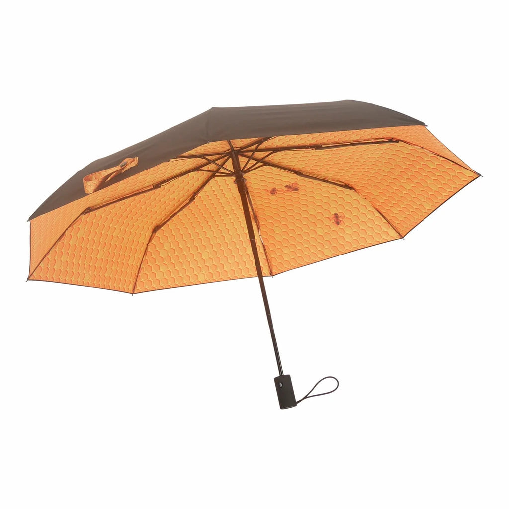 1. Honeycomb and bee pattern umbrella with black exterior, open view, showcasing vibrant design and windproof structure