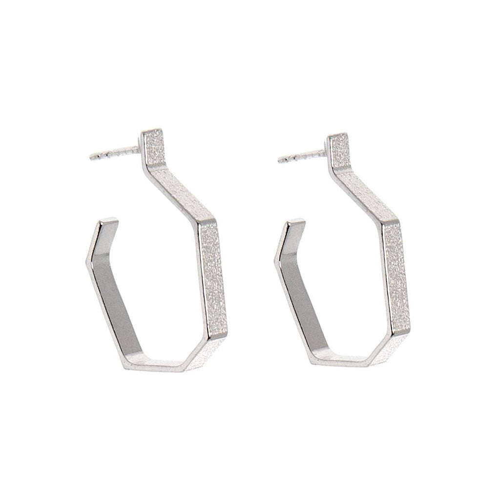 2. Studio image of Lisa Kroeber Jewellery Hoops Silver Earrings in 925 Silver, highlighting classic hoop design