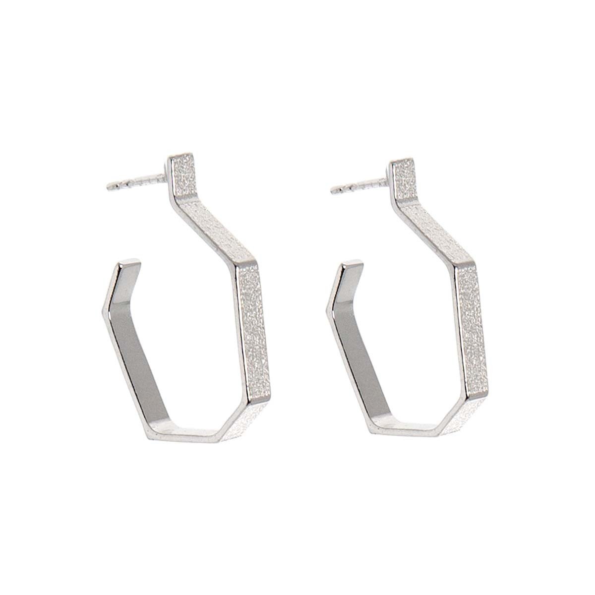 2. Studio image of Lisa Kroeber Jewellery Hoops Silver Earrings in 925 Silver, highlighting classic hoop design