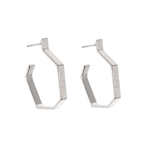 2. Studio image of Lisa Kroeber Jewellery Hoops Silver Earrings in 925 Silver, highlighting classic hoop design