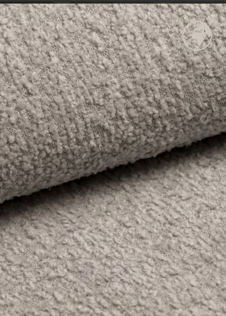 2. Close-up of textured bouclé fabric in pearl white for children's swing