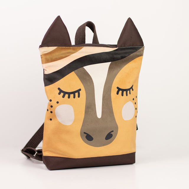 6. Muni horse backpack in studio, highlighting adjustable straps and horse design