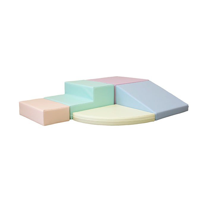 23. IGLU pastel foam block set arranged in a corner climber setup on a white background