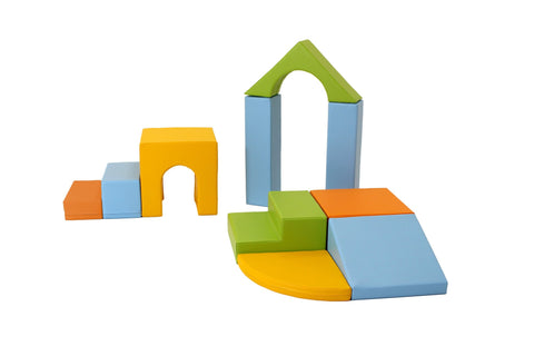 1. IGLU 10-piece foam block set in light multicolor arranged in a playroom setting with carpeted floor