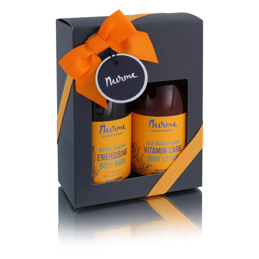 2. Nurme Spice Orange Natural Body Care Set in elegant gift box with orange ribbon, featuring body wash and lotion