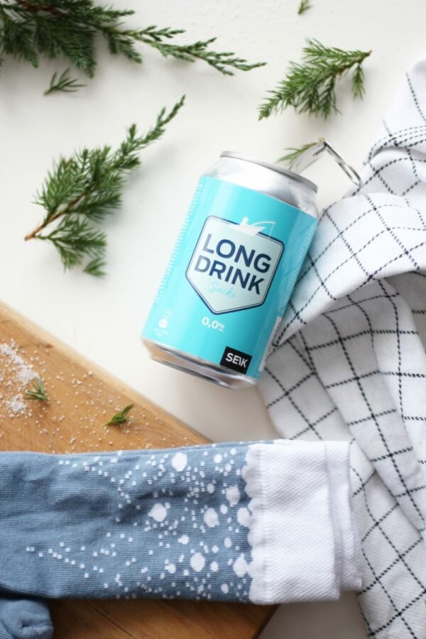 4. SEIK Long Drink Socks in blue with white speckles, shown with Long Drink can and checkered cloth