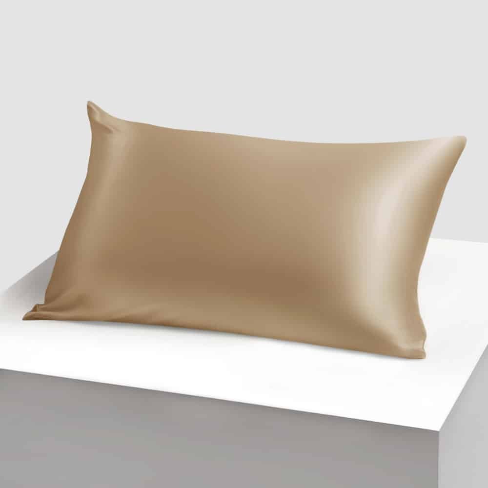 11. Cappuccino Mulberry silk pillowcase on a white platform, showcasing smooth texture