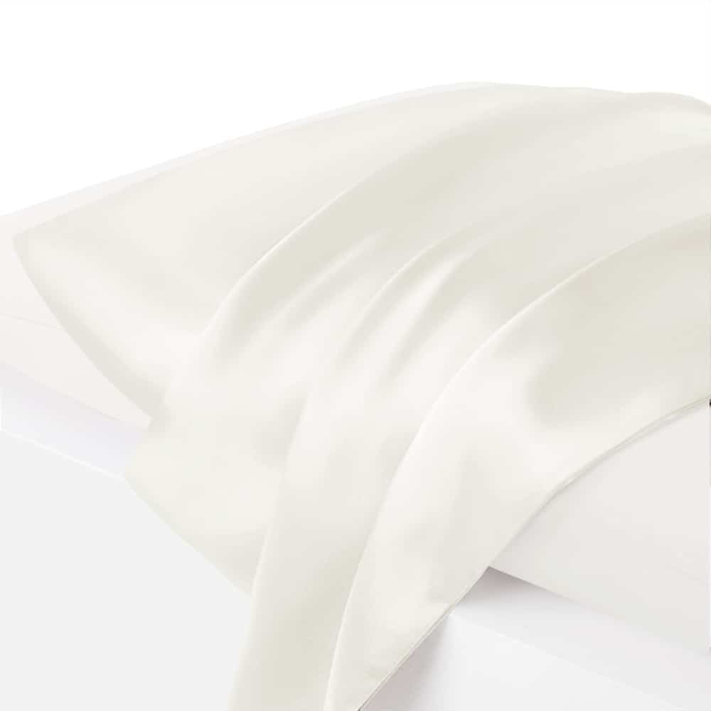 4. Close-up of ecru Mulberry silk pillowcase with draped fabric, showcasing sheen