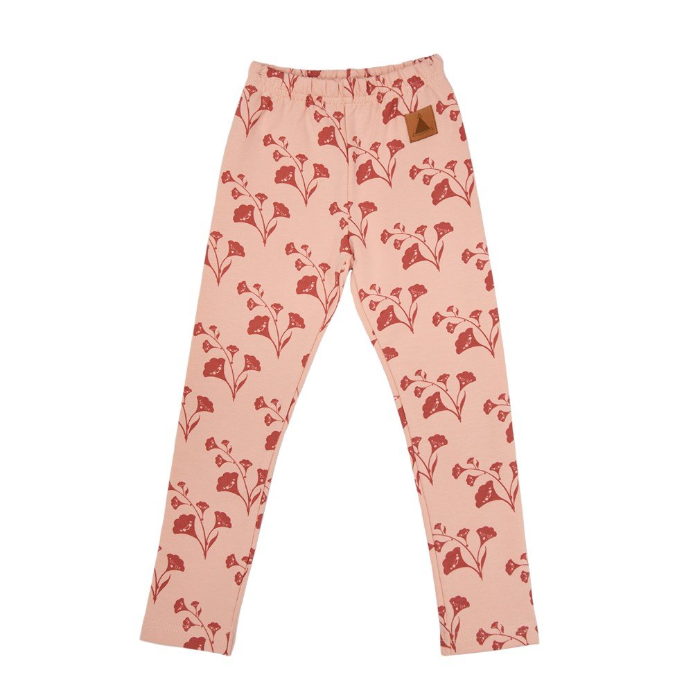 4. Flat lay of kids' pink leggings with red bellflower print and elastic waistband, made from OEKO-TEX cotton and elastane by Zezuzulla