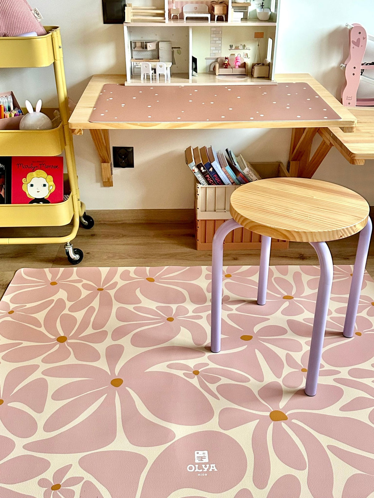 1. Children's room with pink daisy-patterned OLYA KIDS floor mat and stool