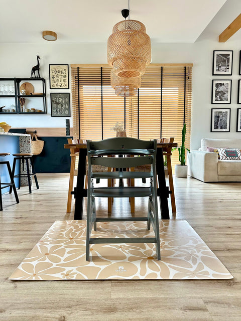 1. Dining area with high chair on beige daisy-patterned OLYA KIDS floor mat