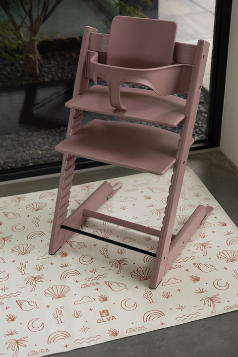1. Pink high chair on OLYA KIDS palm beach terra floor mat in modern home setting