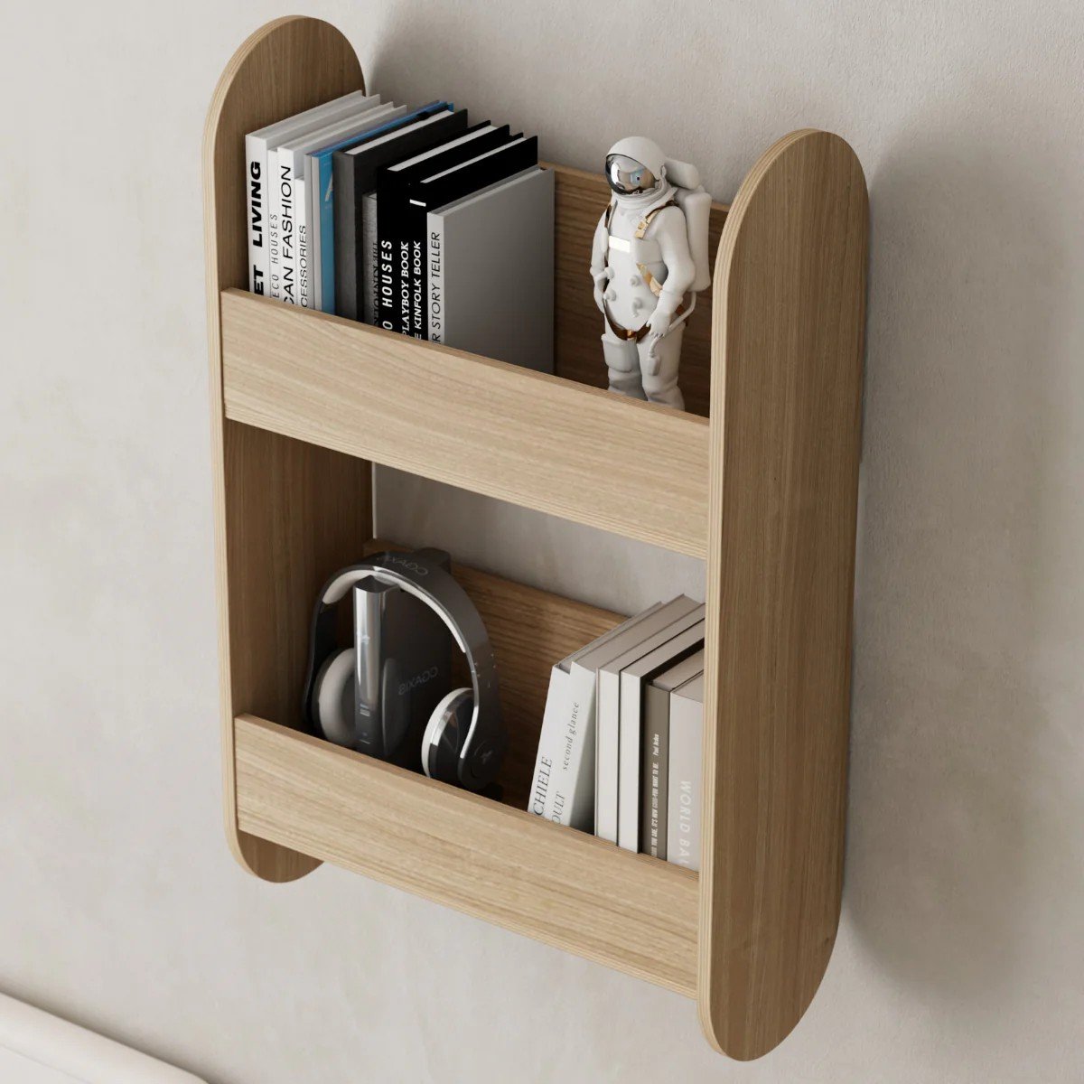 1. Wall-mounted kids wooden bookshelf in light wood finish holding books and toys, shown in a nursery setting