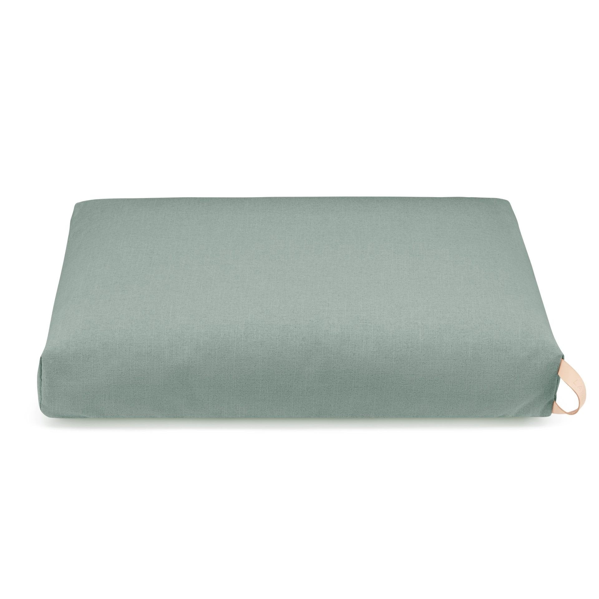 2. Soft teal Kiima dog cushion by Labbvenn with natural leather handle, shown on a white background highlighting its elegant and durable design.
