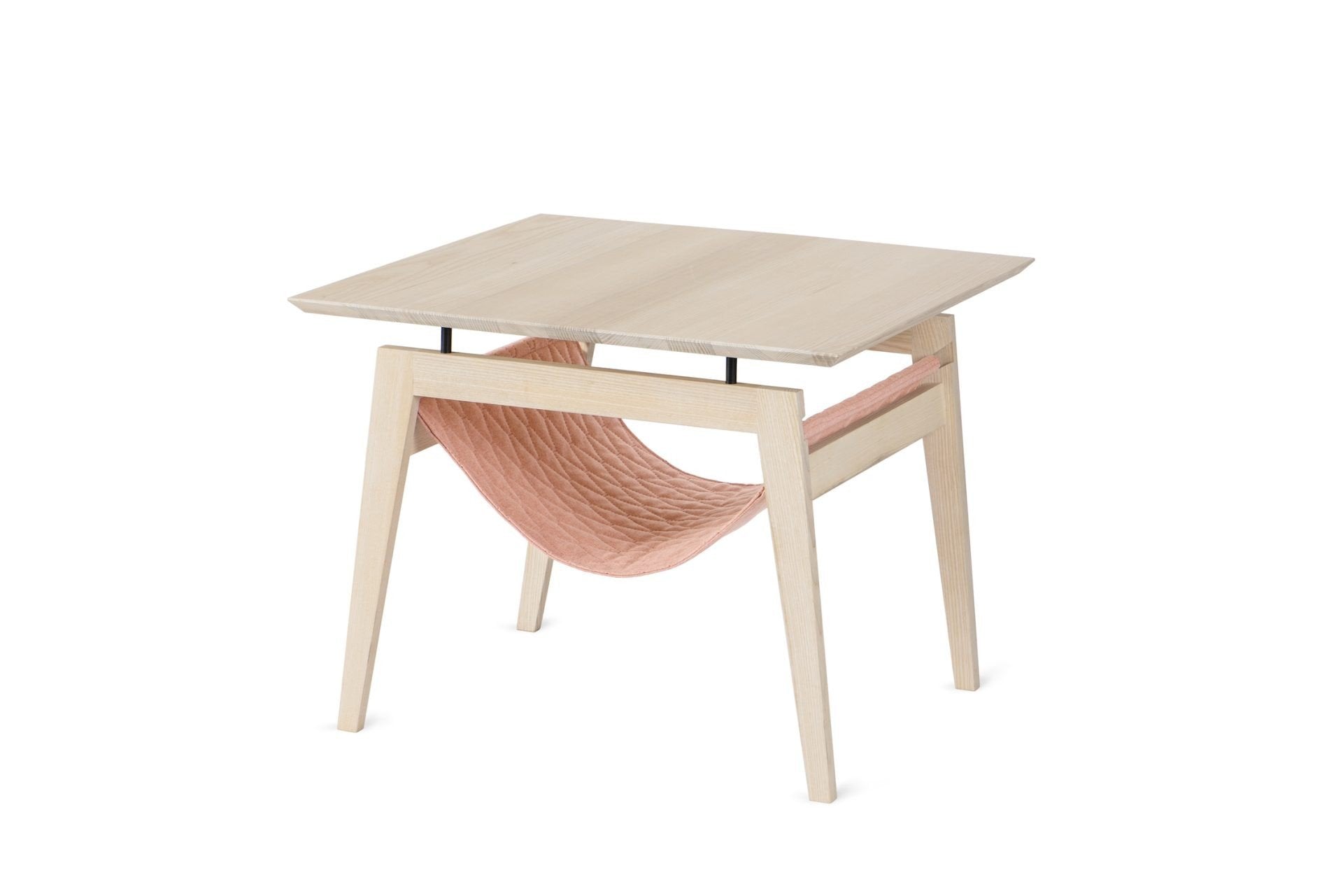 2. Scandinavian-style Kikko table by Labbvenn with light wood finish and raspberry quilted fabric hammock for cats, featuring minimalist design and metal elements, shown in studio setting.