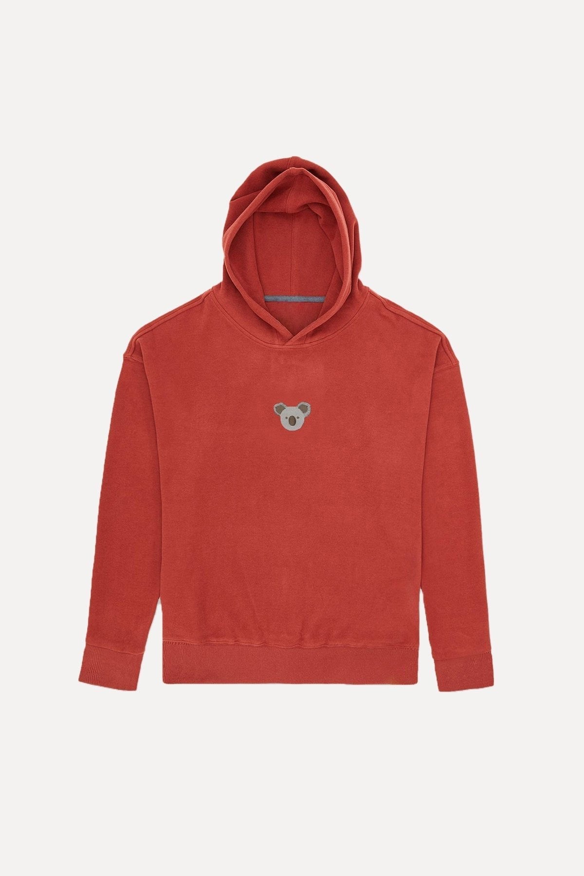 2. Unisex Sossu Koala Hoodie in terracotta with embroidered koala detail, studio product image