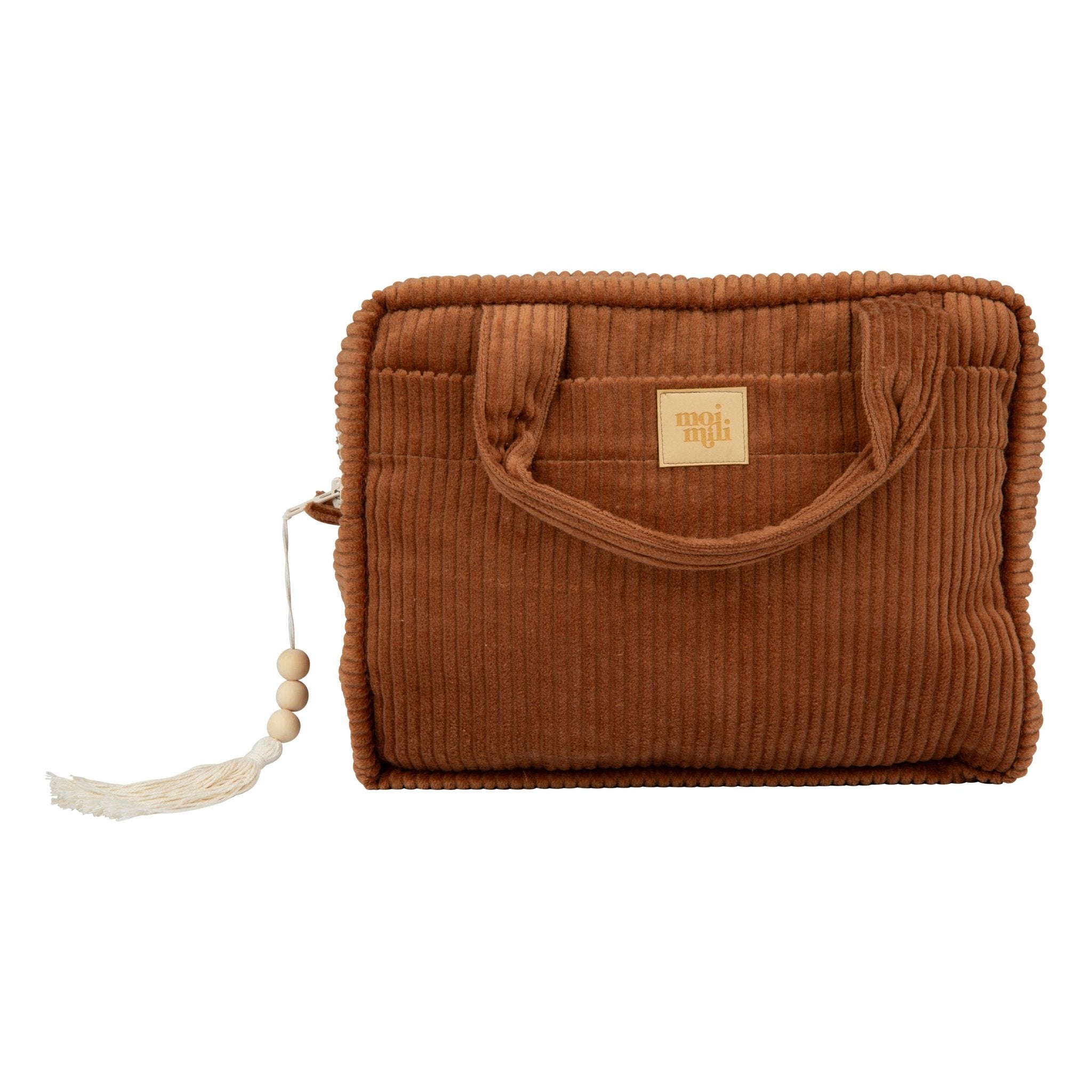 7. Studio shot of caramel large makeup bag with tassel and moi mili logo, highlighting its corduroy material and design
