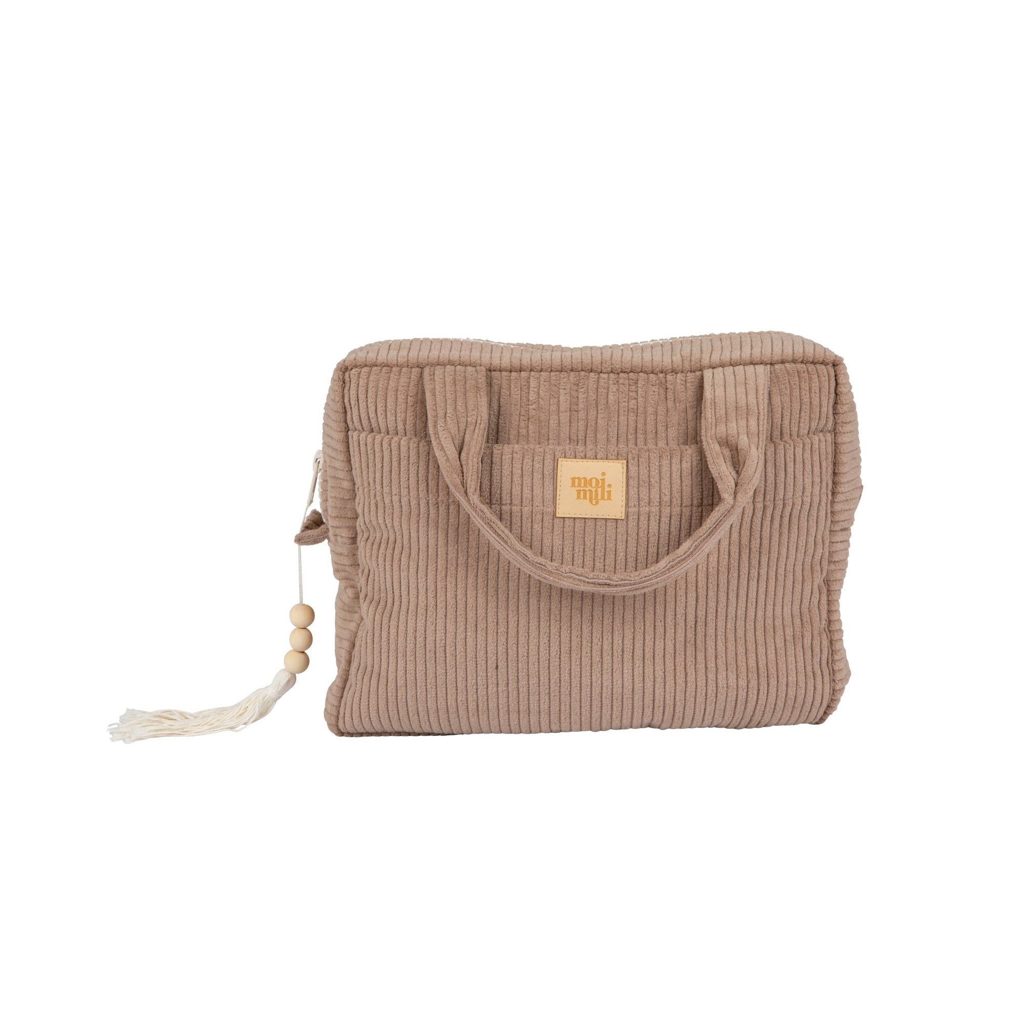 5. Studio shot of latte-colored large makeup bag with Moi Mili logo and tassel detail, showcasing design and style.