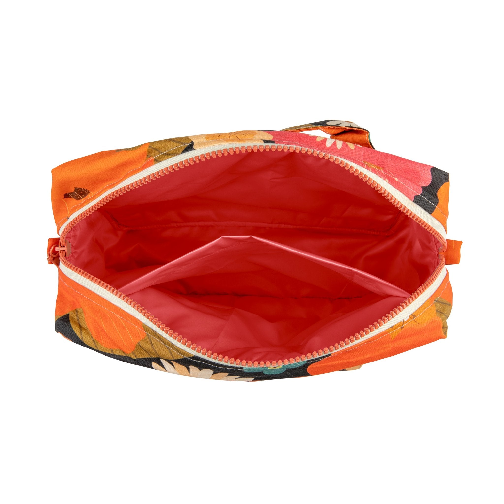 7. Interior view of large makeup bag showing spacious red lining
