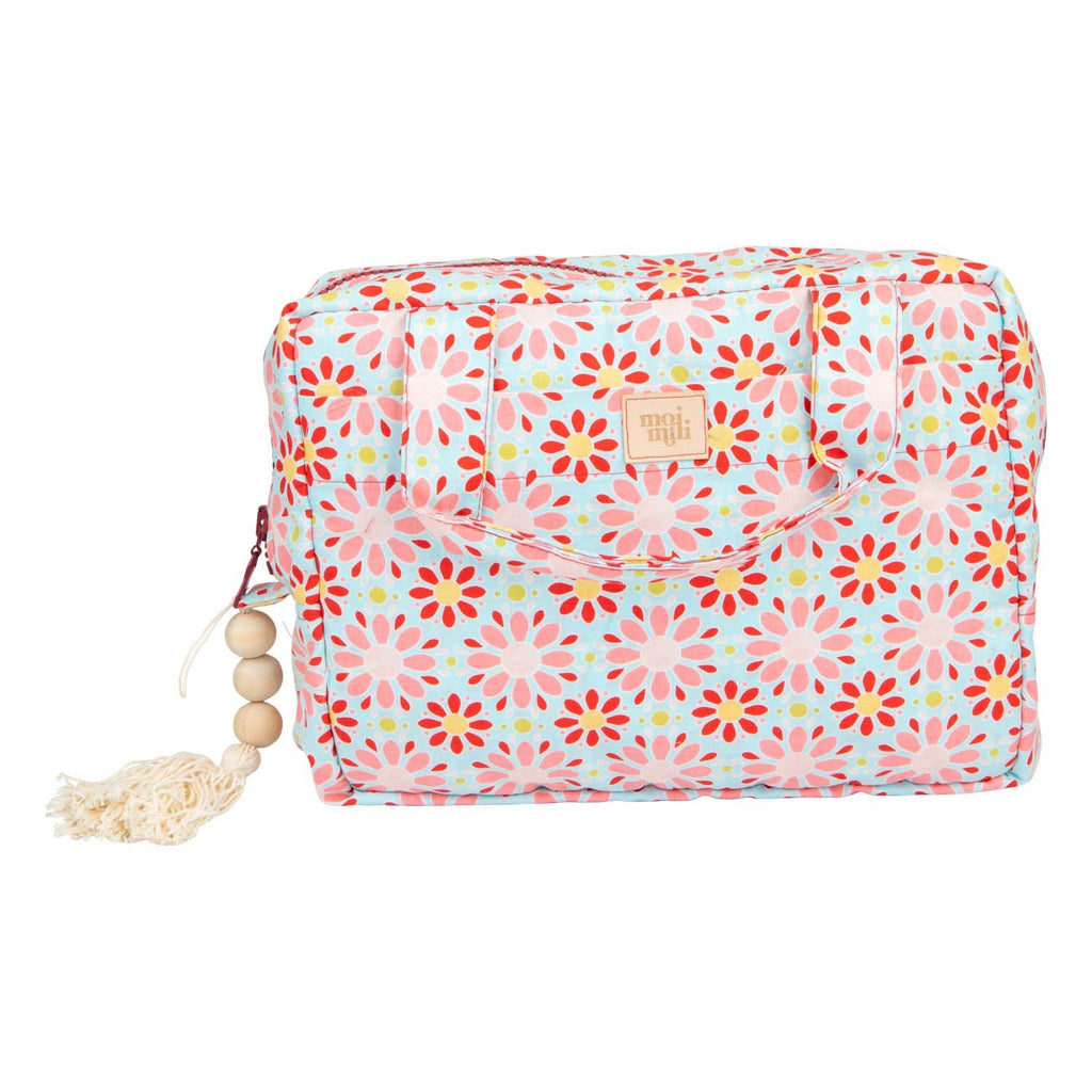 2. Moi Mili large makeup bag with red flower print on white background showing tassel detail