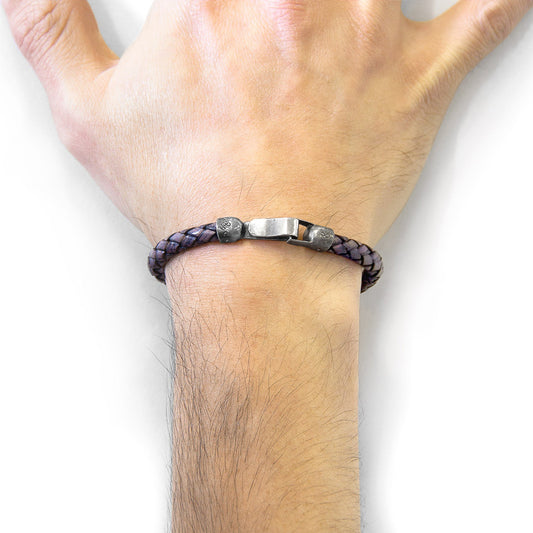 1. Men's indigo blue braided leather bracelet by ANCHOR & CREW, worn on wrist with sterling silver clasp