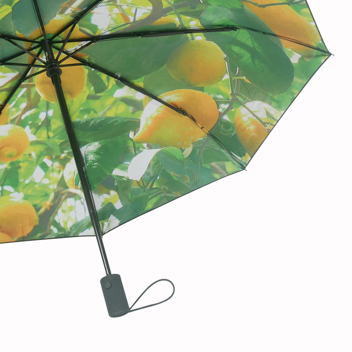 5. Close-up of lemon print umbrella open, highlighting vibrant lemon and leaf design
