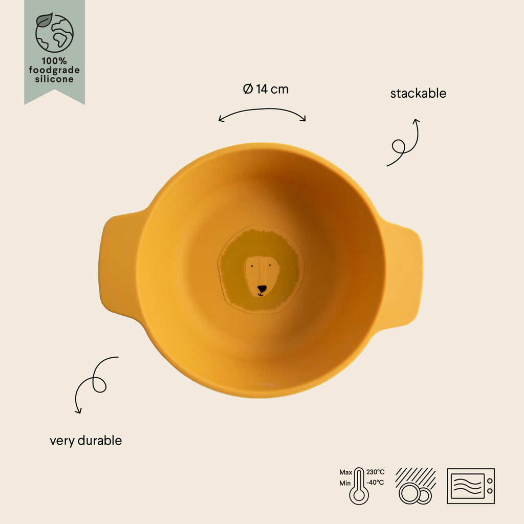 2. Yellow silicone bowl with lion face design, showing stackable and durable features with temperature icons