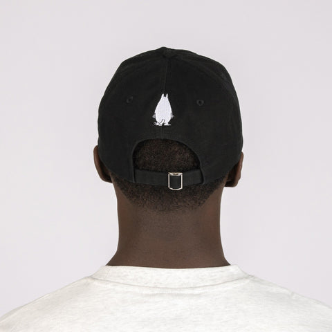 2. Black Grumpy Moomintroll Dad Cap worn by male model, back view highlighting adjustable strap