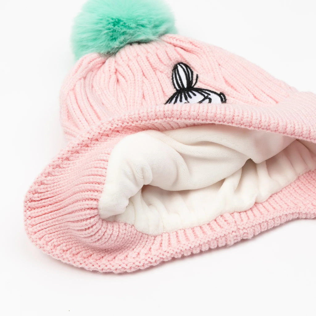 4. Inside view of pink Moomin beanie showing soft white fleece lining and green pom-pom