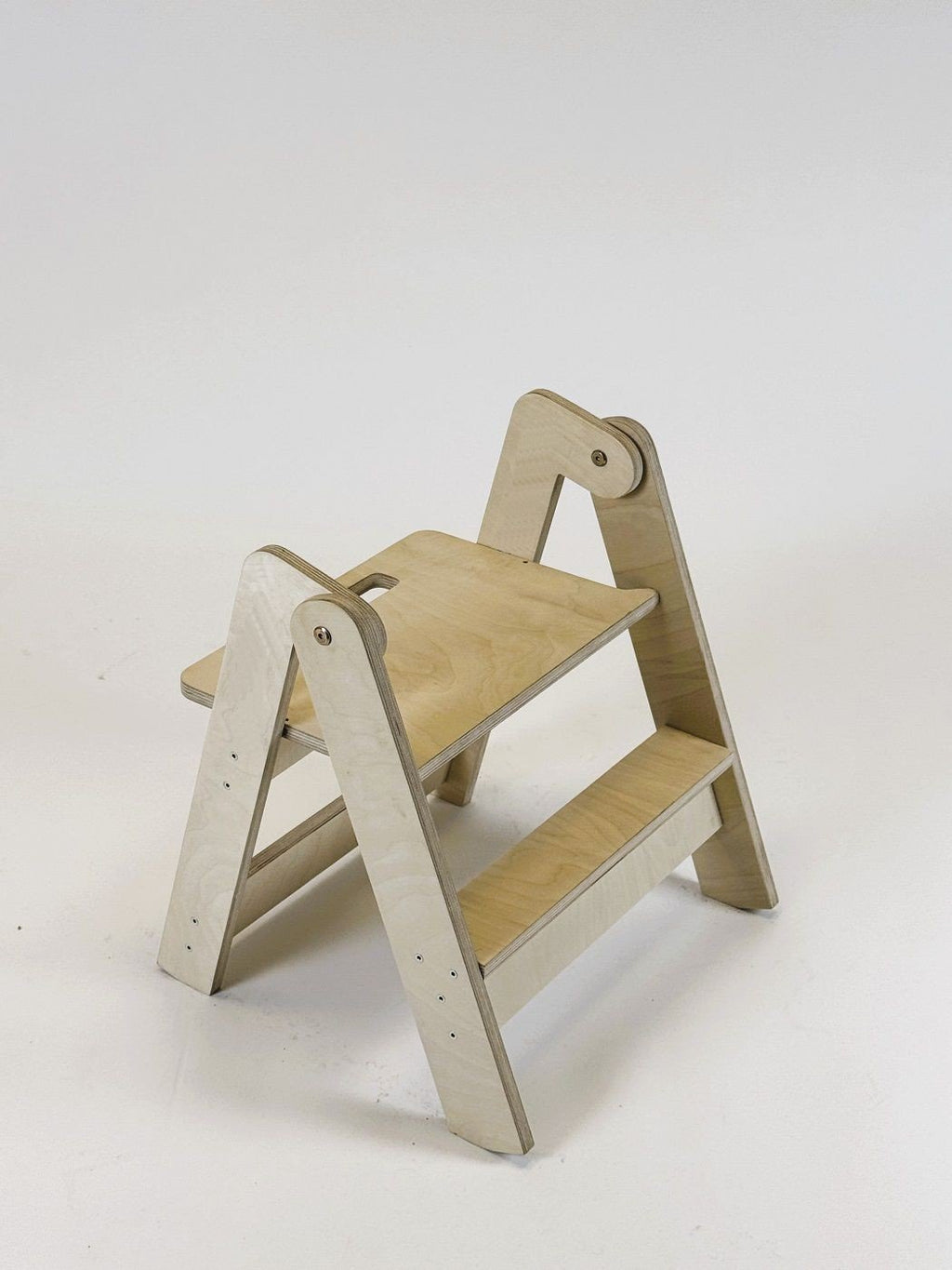 2. Wooden step stool with beige sides and natural wood steps on white background