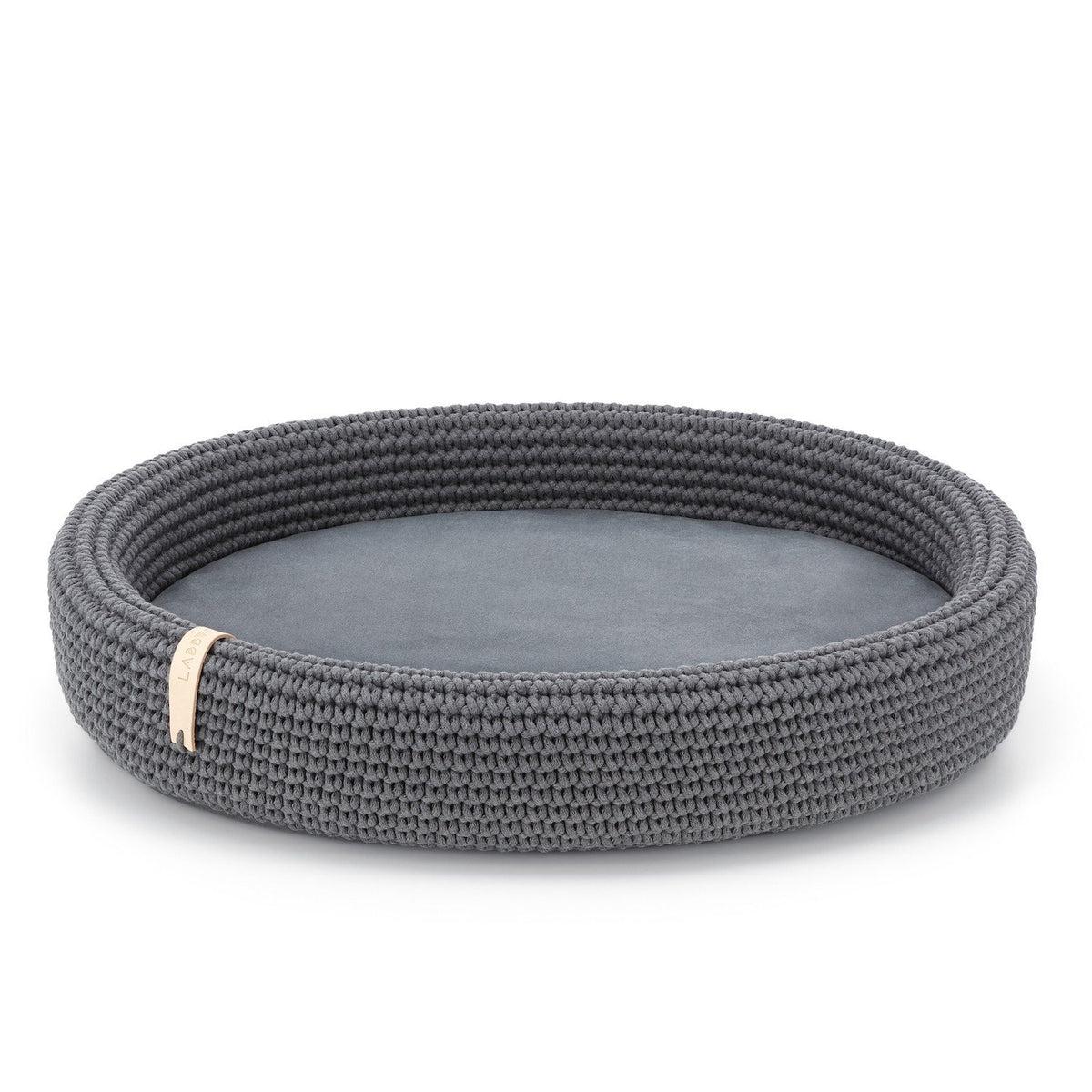 2. Studio shot of Labbvenn Lukko dog bed in anthracite, featuring oval shape and braided cotton rope design with removable cushion
