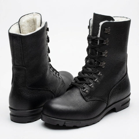 2. Black M77 Norwegian combat boots with white faux fur lining on clean white background, showcasing durable full-grain leather and lace-up design