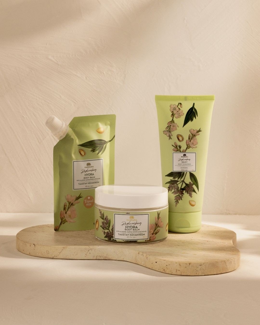 3. Magrada X Lauren skincare set including moisturizing shower gel, pouch, and jar, displayed on stone tray