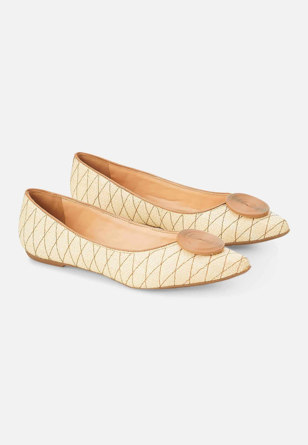 12. Pair of Mangará Coroba Ballerinas in studio, showcasing raffia fabric and pointed-toe design
