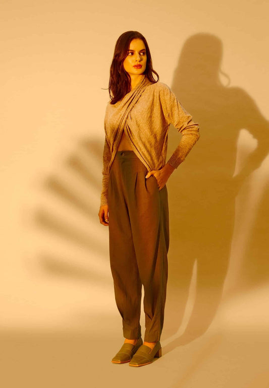 1. Women's Mangará Louro Leather Loafers in beige worn by model in studio setting
