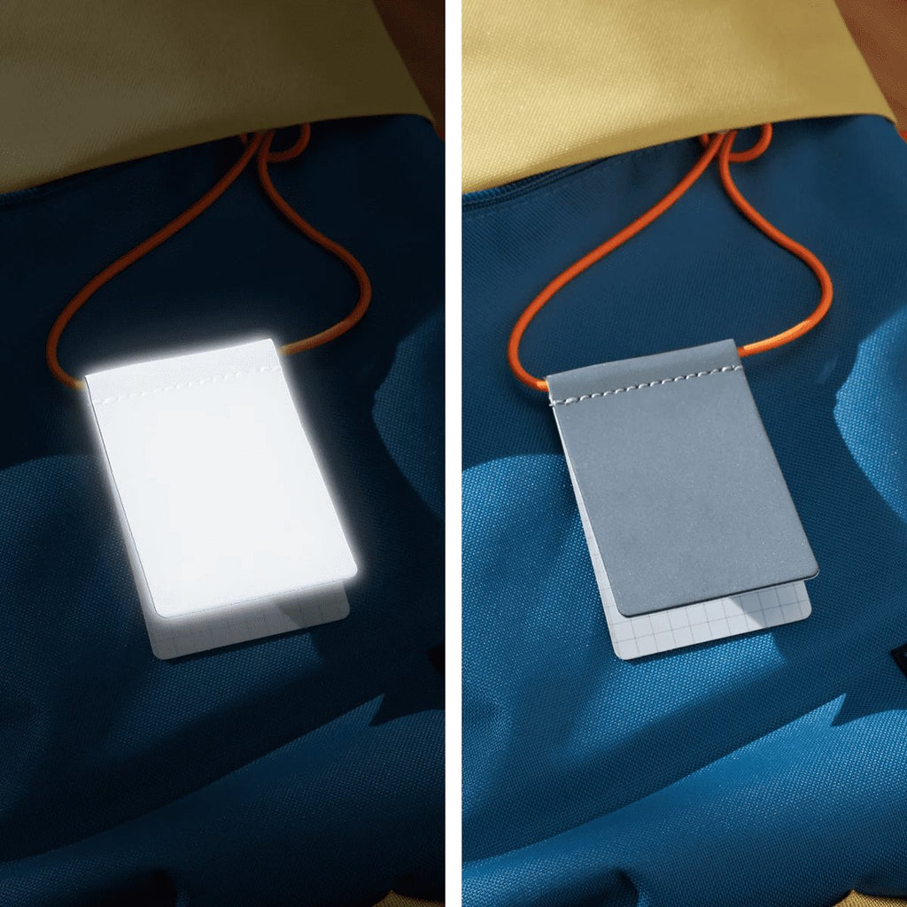 5. MARCH Reflective Luggage Tag in neon orange, shown in reflective and non-reflective states